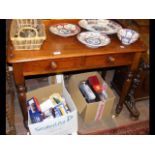 A Victorian washstand with two drawers to the front