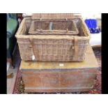 An old pine blanket chest, together with wicker ba