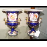 A pair of 19cm high hand painted campana shaped va