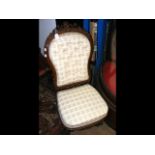 Antique nursing chair with carved backrest and cab