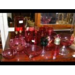 A selection of cranberry glass, including jug, sug