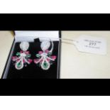 A pair of lady's decorative earrings set with moon