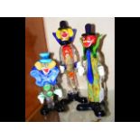 A Murano glass clown, together with two others