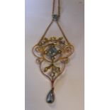 An Edwardian pale blue stone and seed pearl pendan