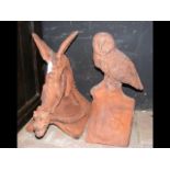 A 45cm high terracotta roof finial in the form of