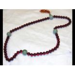 A jade and Bakelite? necklace