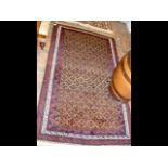 Antique Middle Eastern rug with geometric border -