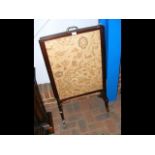 A Regency rosewood adjustable firescreen