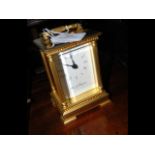 A modern Fox & Simpson brass cased carriage clock