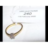A diamond baguette shaped Solitaire ring in gold s