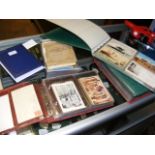 Various albums containing vintage postcards, inclu