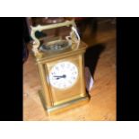 A brass cased carriage clock by Dimmer & Son, Sout