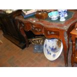 An antique style French writing desk with green le