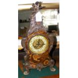 A French brown onyx metal mounted two train mantel