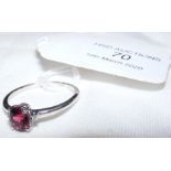 A white gold red spinel and diamond ring