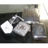 Two silver vesta cases, a silver cigarette case an