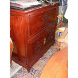 The matching Chinese hardwood drinks cabinet with