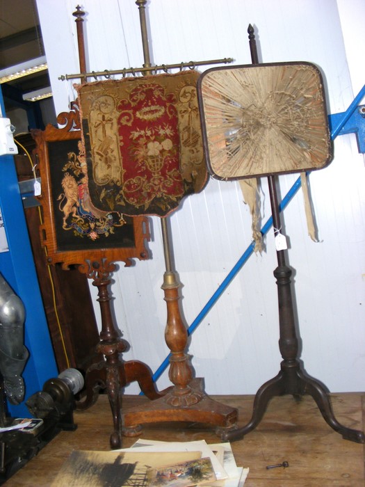 A 19th century pole screen with embroidery panel,