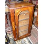 A Victorian inlaid music cabinet