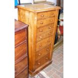 A Victorian walnut seven drawer Wellington chest -