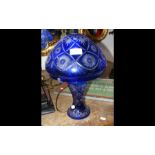 A blue overlay glass table lamp - 36cm high