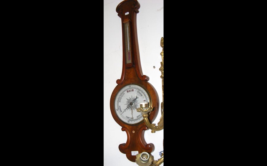 A 19th century wall barometer/thermometer