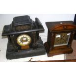 A Victorian mantel clock, together with one other