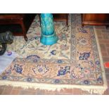 A Middle Eastern style carpet with geometric border -