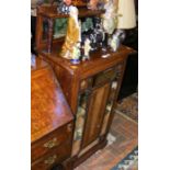 A 19th century rosewood music cabinet with inlaid