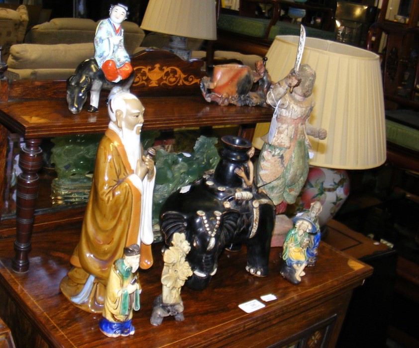 Various oriental figures, carvings