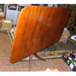 A large mahogany rectangular antique tilt-top dini