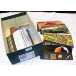 A box containing mint presentation GB packs 1999-2