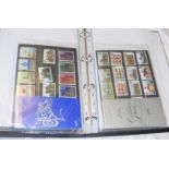 An album containing mint collection packs 1968-198