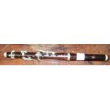 A Miller Browne rosewood marching flute,