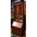 A 19th century inlaid mahogany bureau bookcase wit