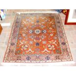 A small Middle Eastern rug with geometric border -