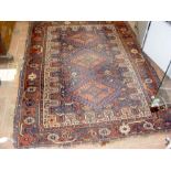 A Middle Eastern rug with geometric border - 164cm