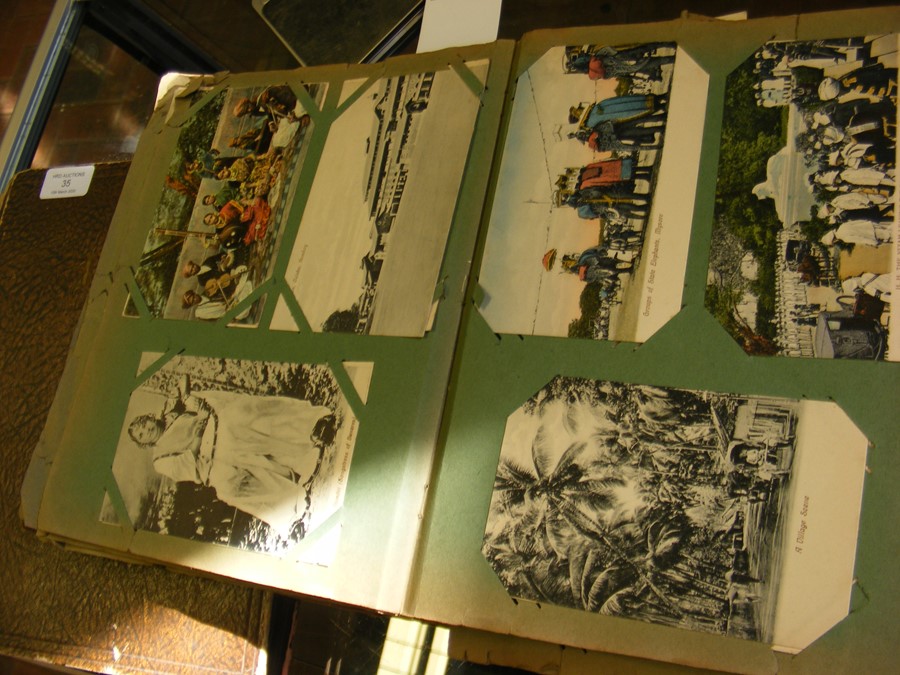 An album containing collectable postcards, togethe - Image 11 of 14