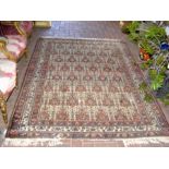 A Middle Eastern style rug with geometric border -