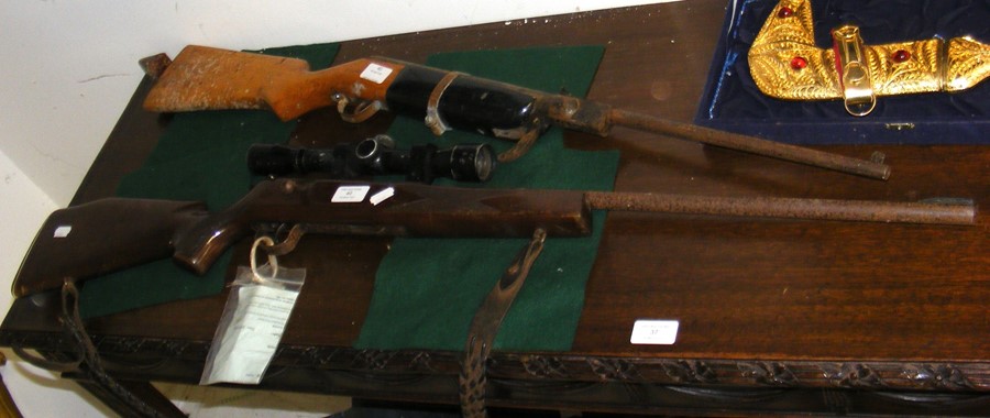 A deactivated .22 rifle, together with an air rifl