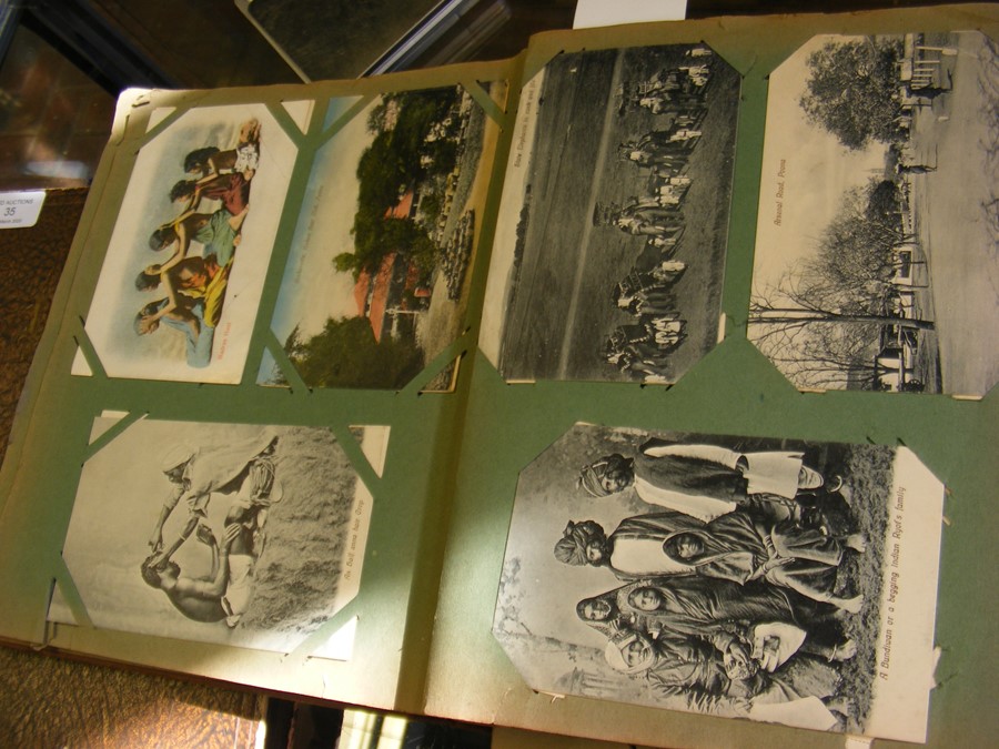 An album containing collectable postcards, togethe - Image 6 of 14