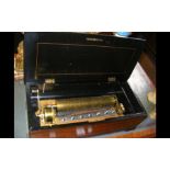 A Victorian cylinder music box with inlaid case -