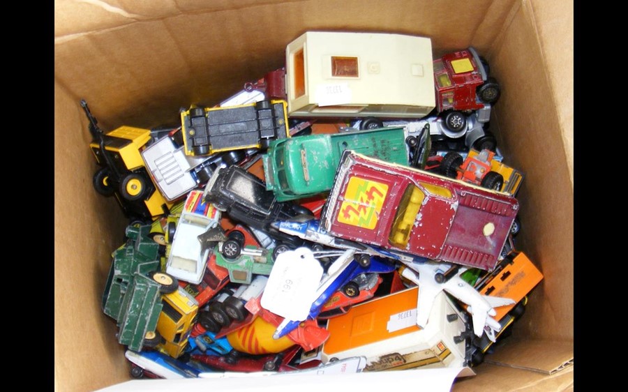 A collection of play worn die-cast vehicles