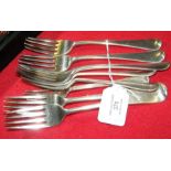 Eight silver dining forks