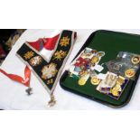A tray of Masonic medals including a 9 carat gold Chapter clasp, sash, etc.