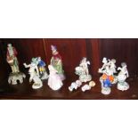 A collection of various porcelain figures, includi