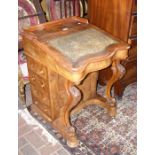 A Victorian walnut Davenport desk