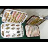 A selection of fishing flies in Okuma case, togeth