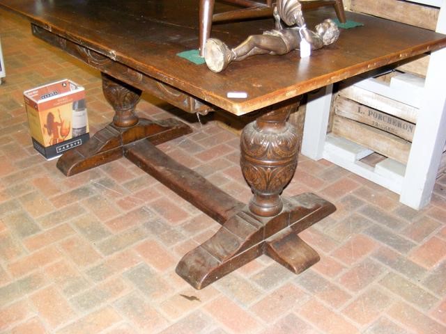 An oak refectory table with carved bulbous support