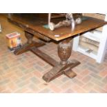 An oak refectory table with carved bulbous support